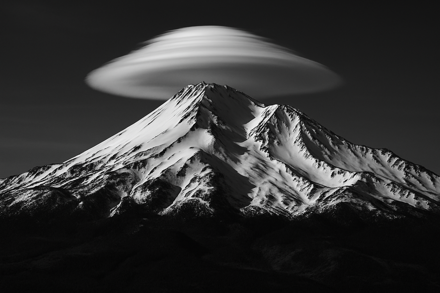 picture of mount shasta with cloud dome in black and white